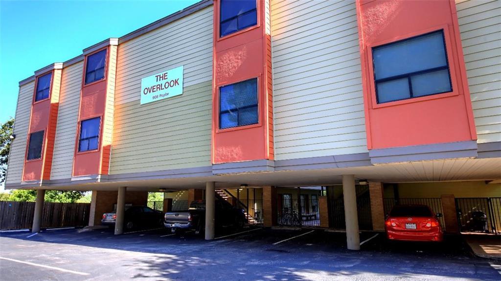 A multi-story exterior features integrated covere