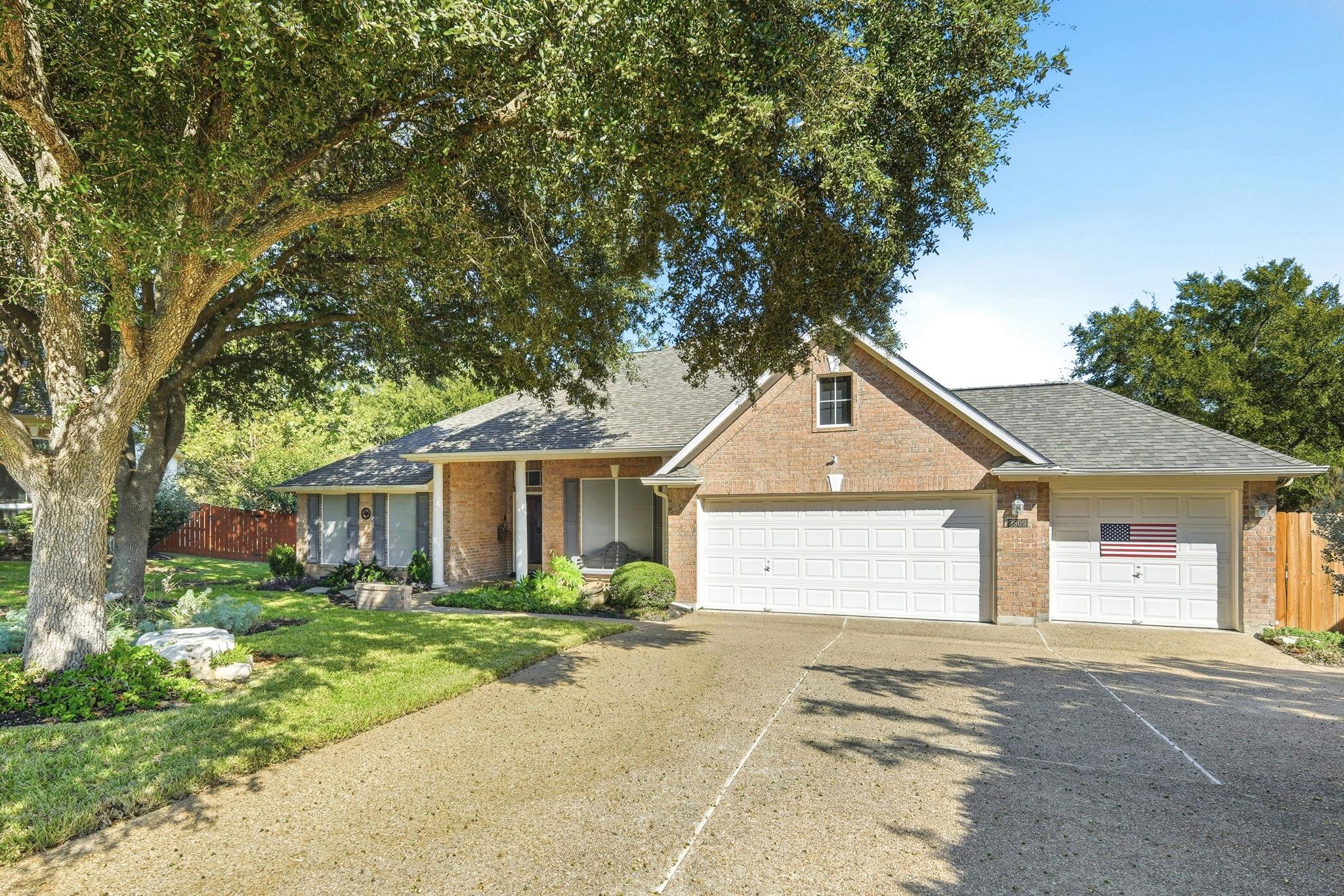 Stately brick exterior showcasing classic rooflin