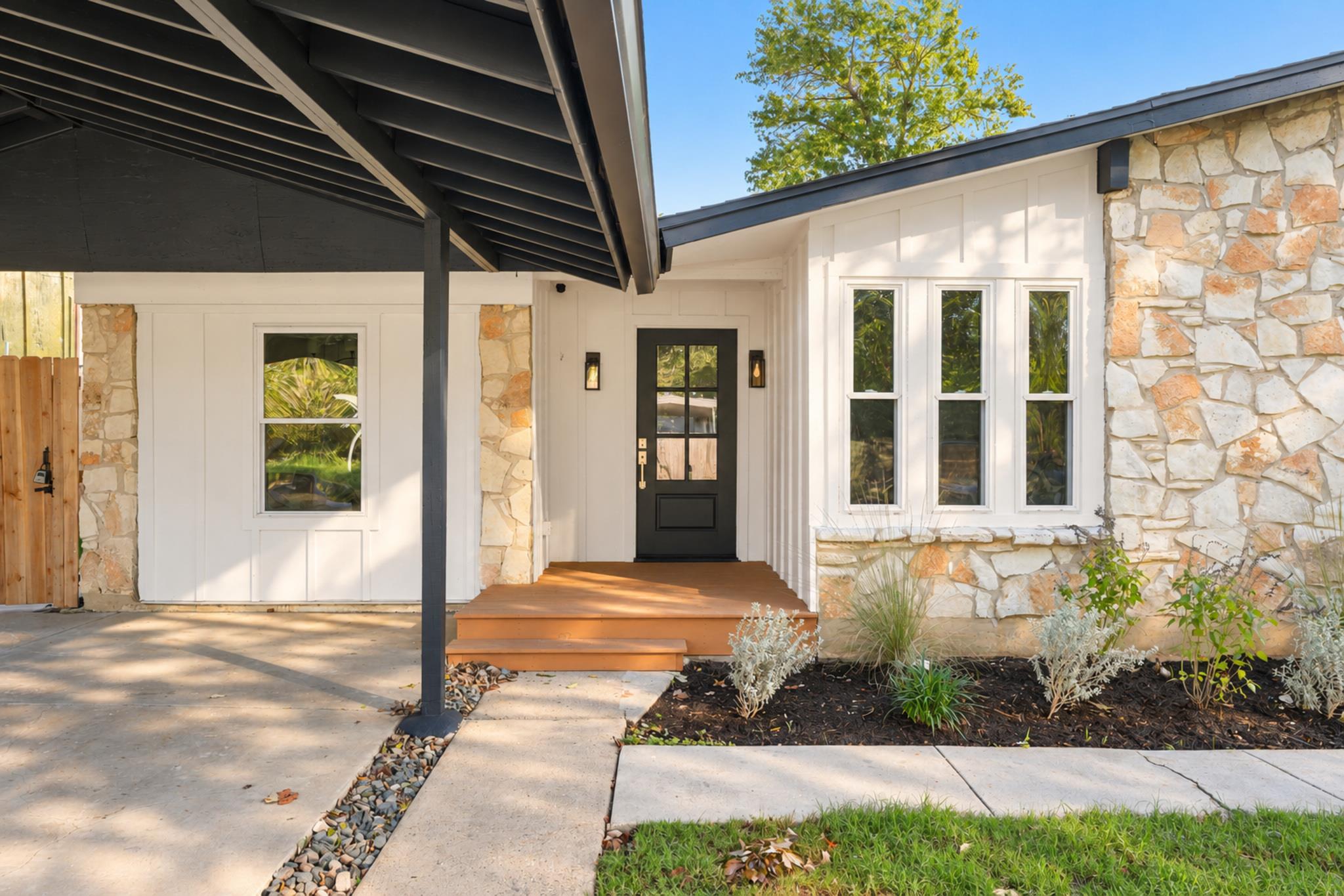 Natural stone accents and clean board-and-batten 