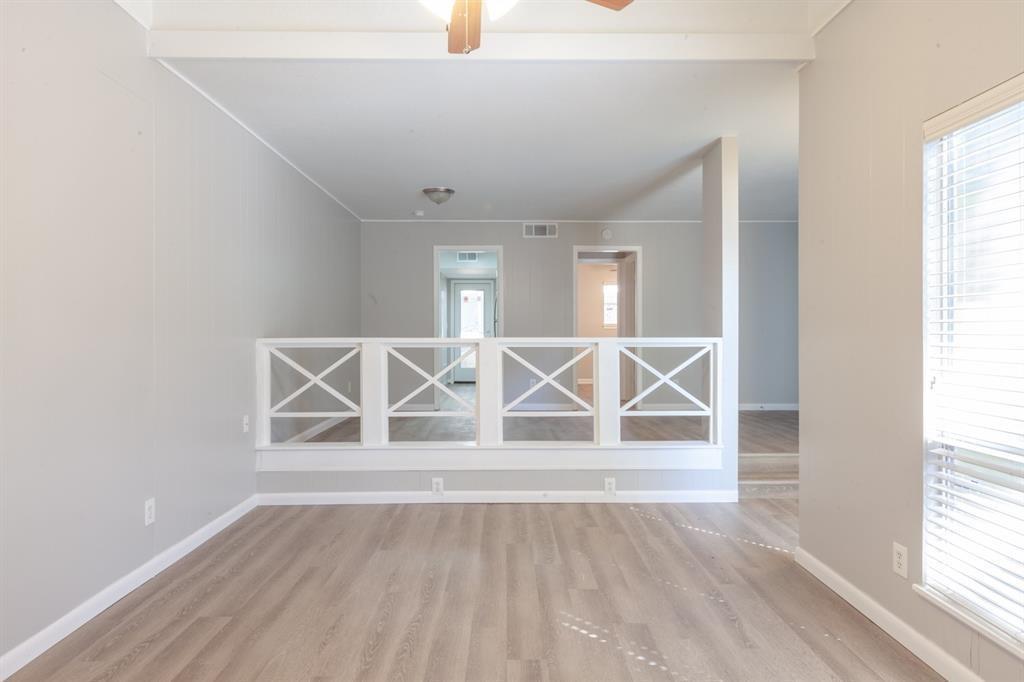An open living space features durable vinyl plank