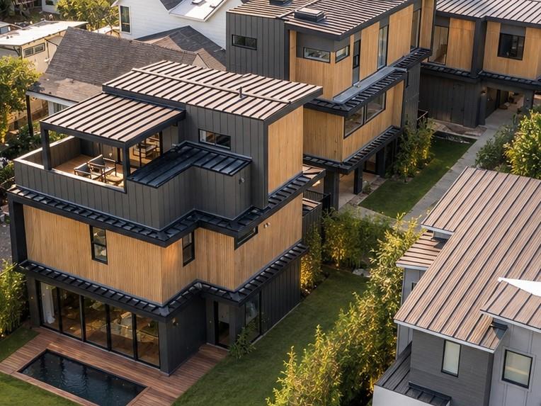 Bold geometric lines and warm natural cladding de