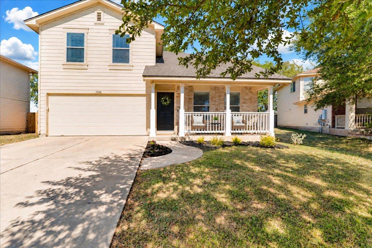 An inviting front porch and classic brick detaili