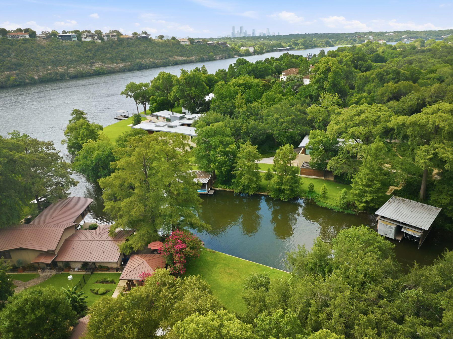 A sweeping aerial view showcases prime waterfront