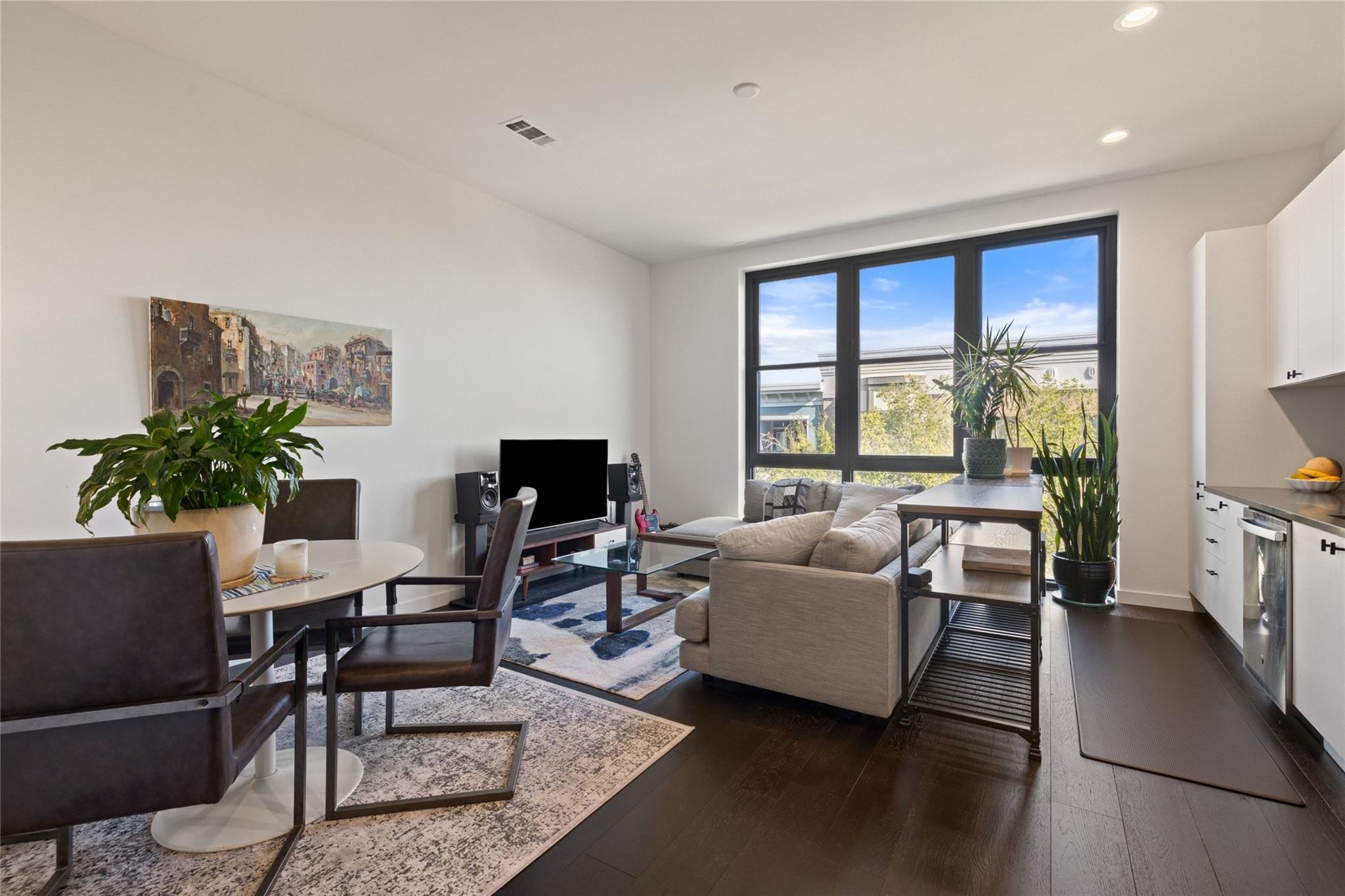 Rich hardwood floors contrast beautifully with cr