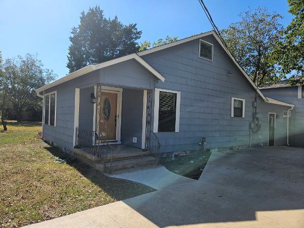 A classic front porch welcomes visitors to this c