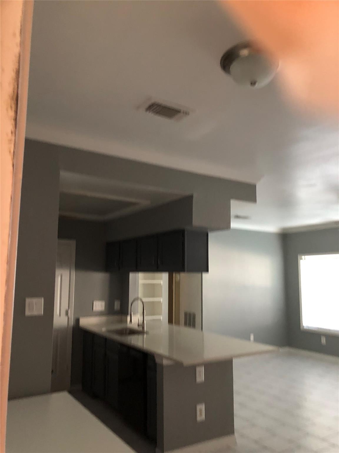 An open floor plan seamlessly connects the functi