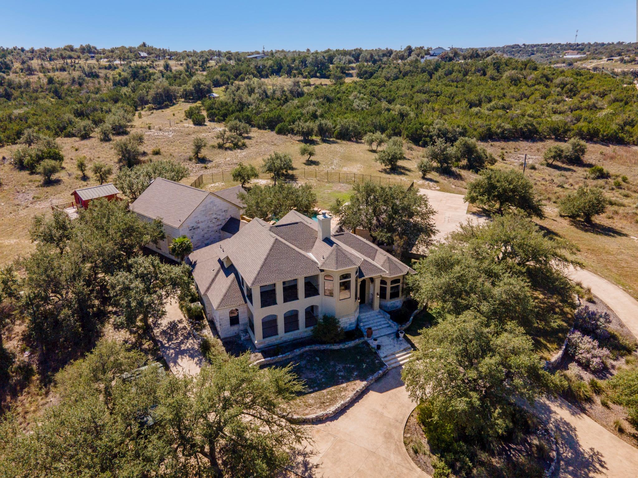 An aerial view showcases this multi-level stone r