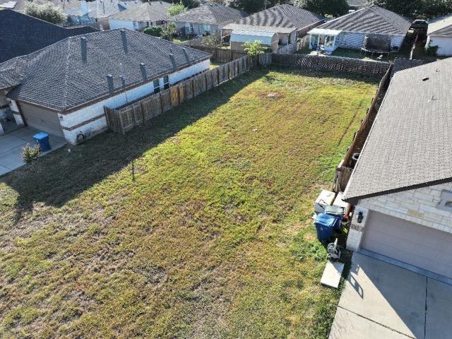 A spacious grassy yard provides abundant outdoor 