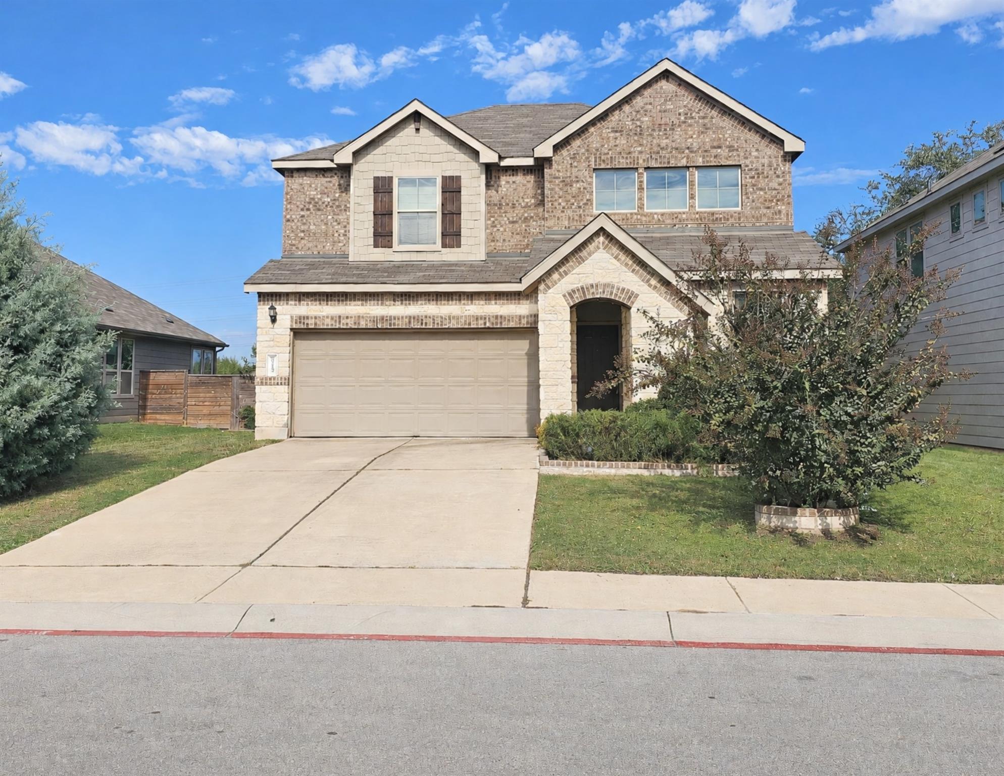 A classic brick exterior paired with a spacious f