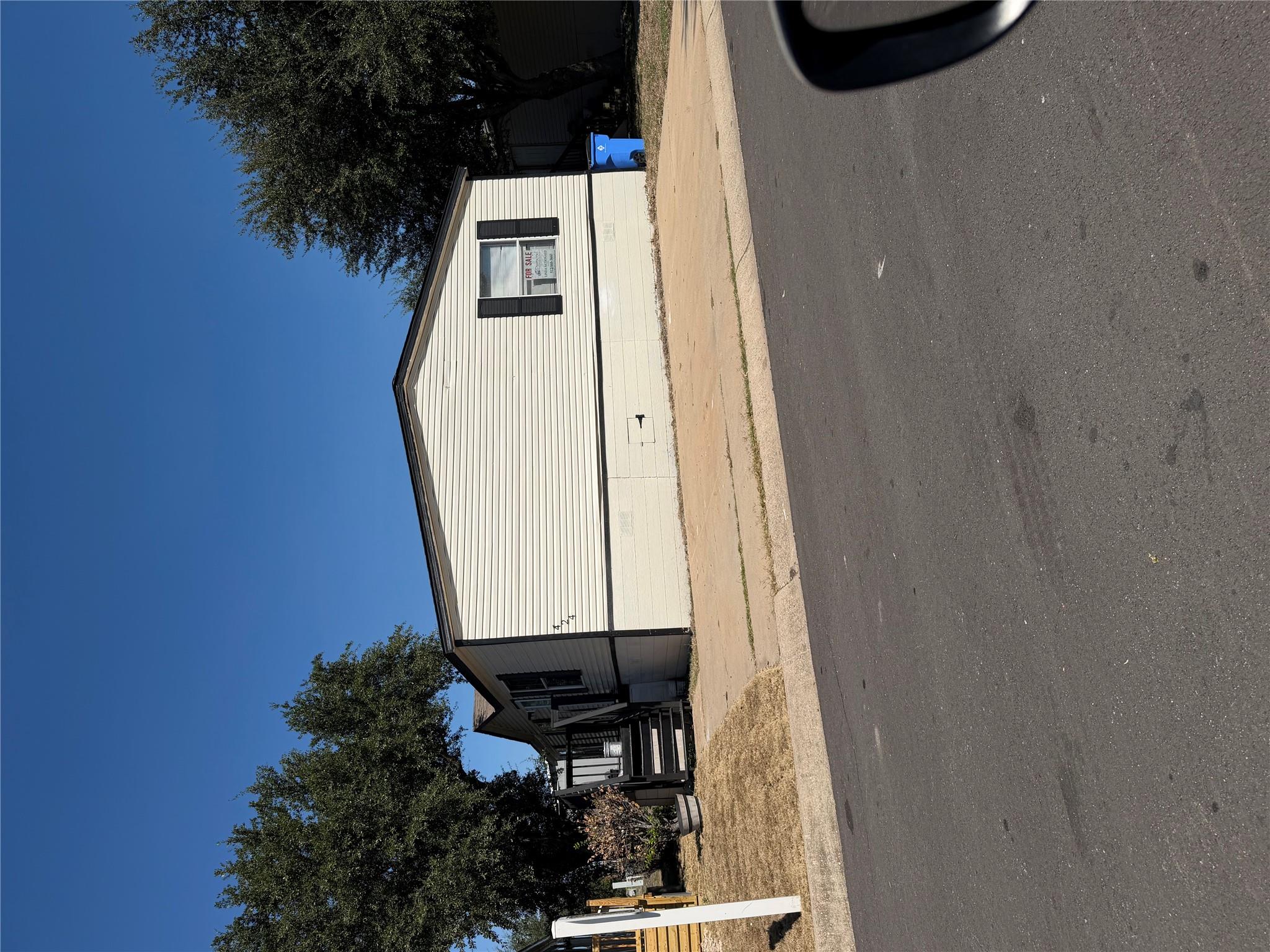 A low-maintenance exterior features vinyl siding 