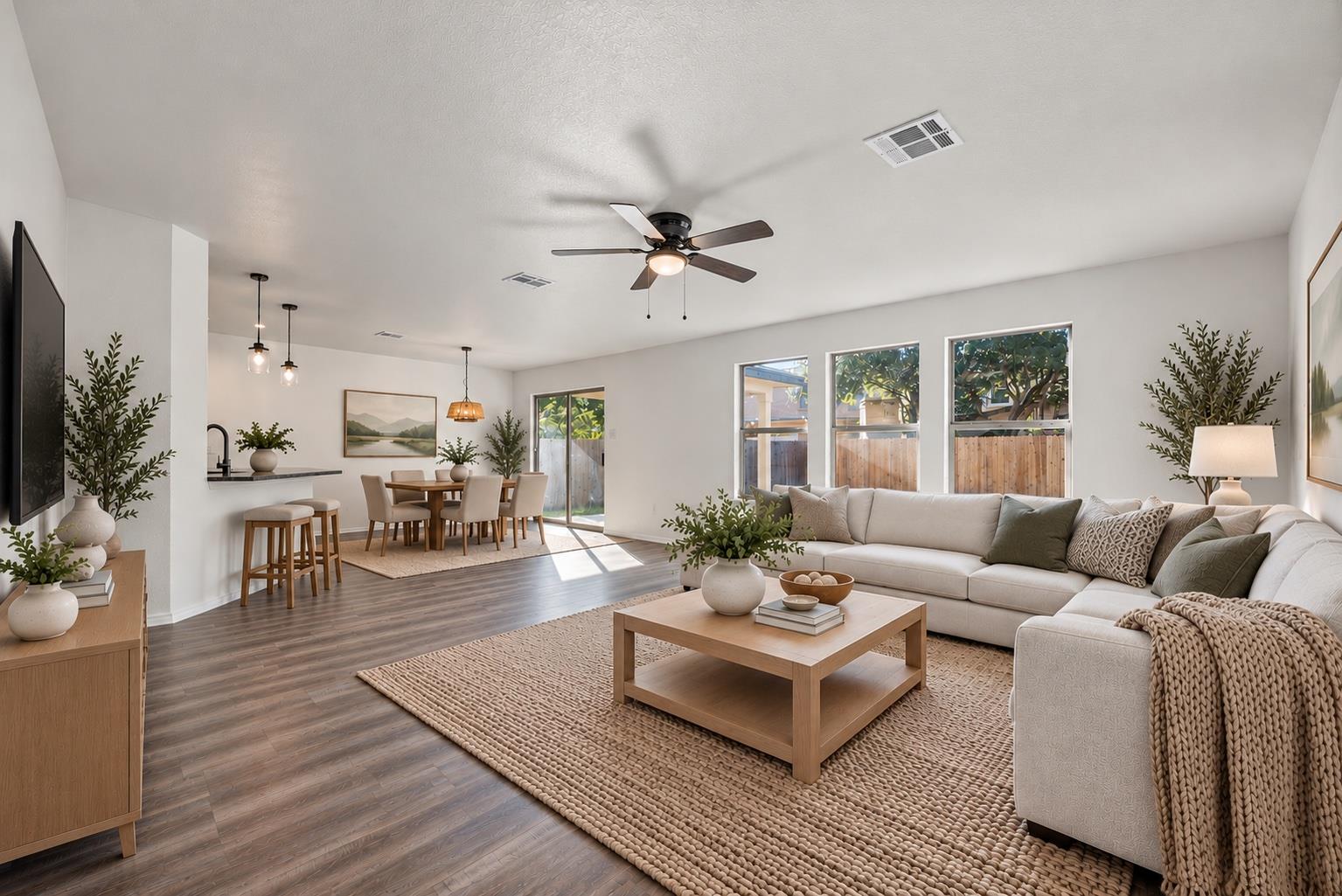 An open-concept living area seamlessly connects t