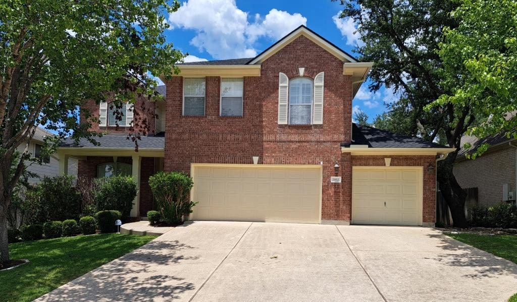 Classic brick architecture meets mature landscapi