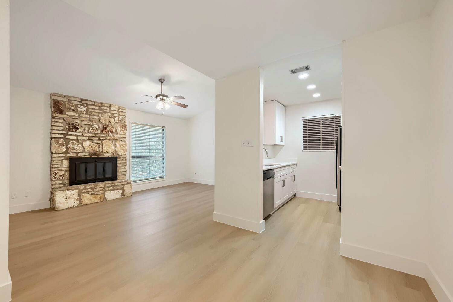 An open layout connects the main living space and