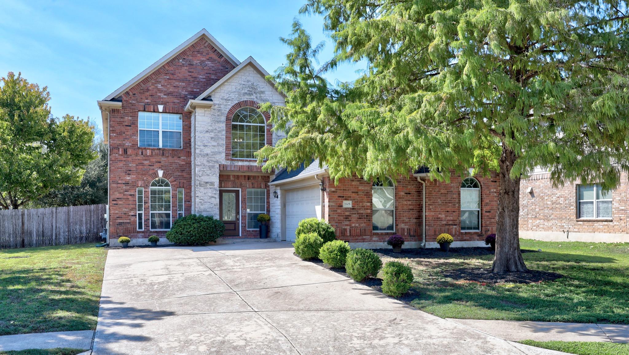 An inviting brick facade combines classic masonry