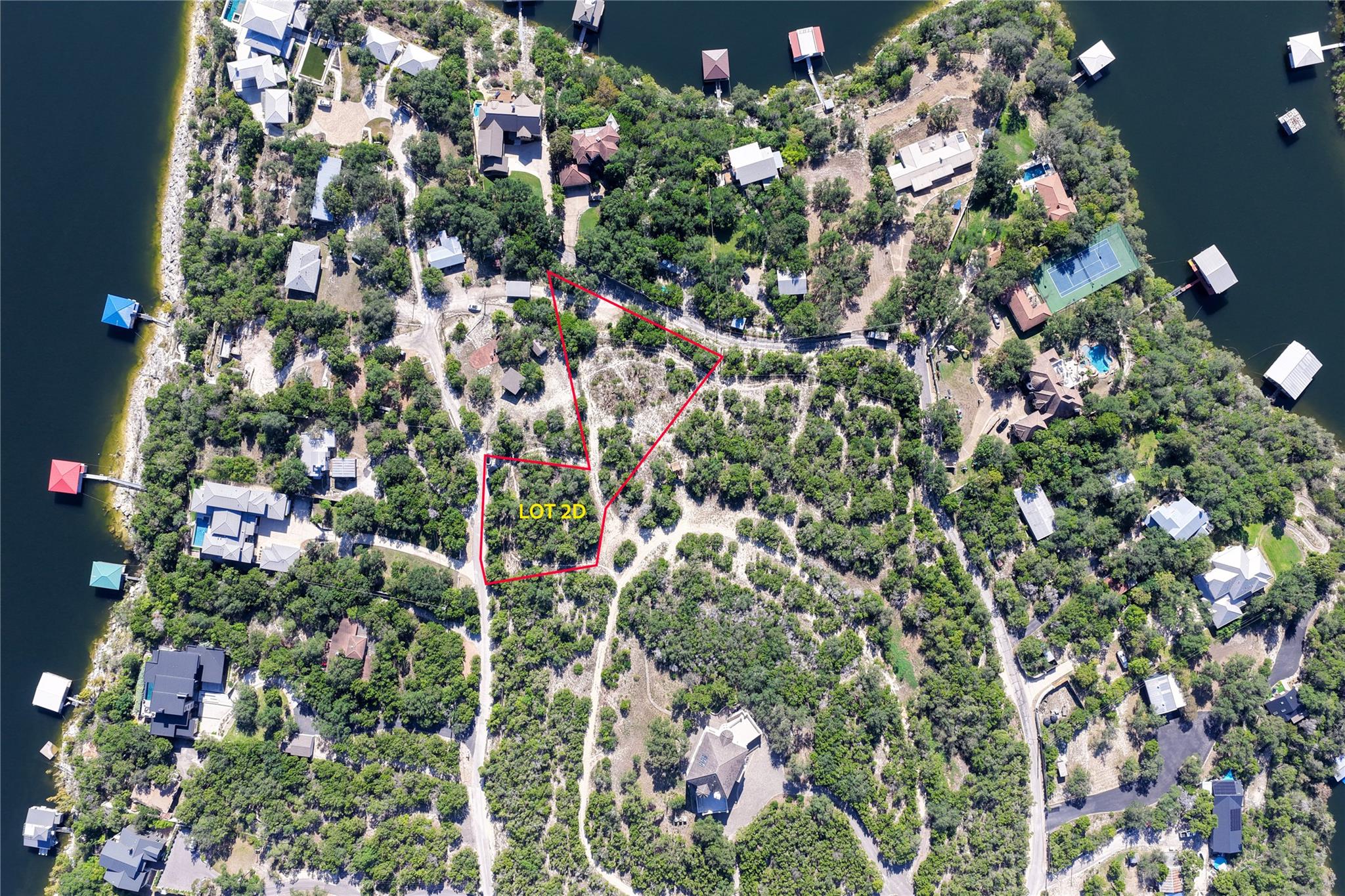 An aerial perspective showcases a prime wooded lo