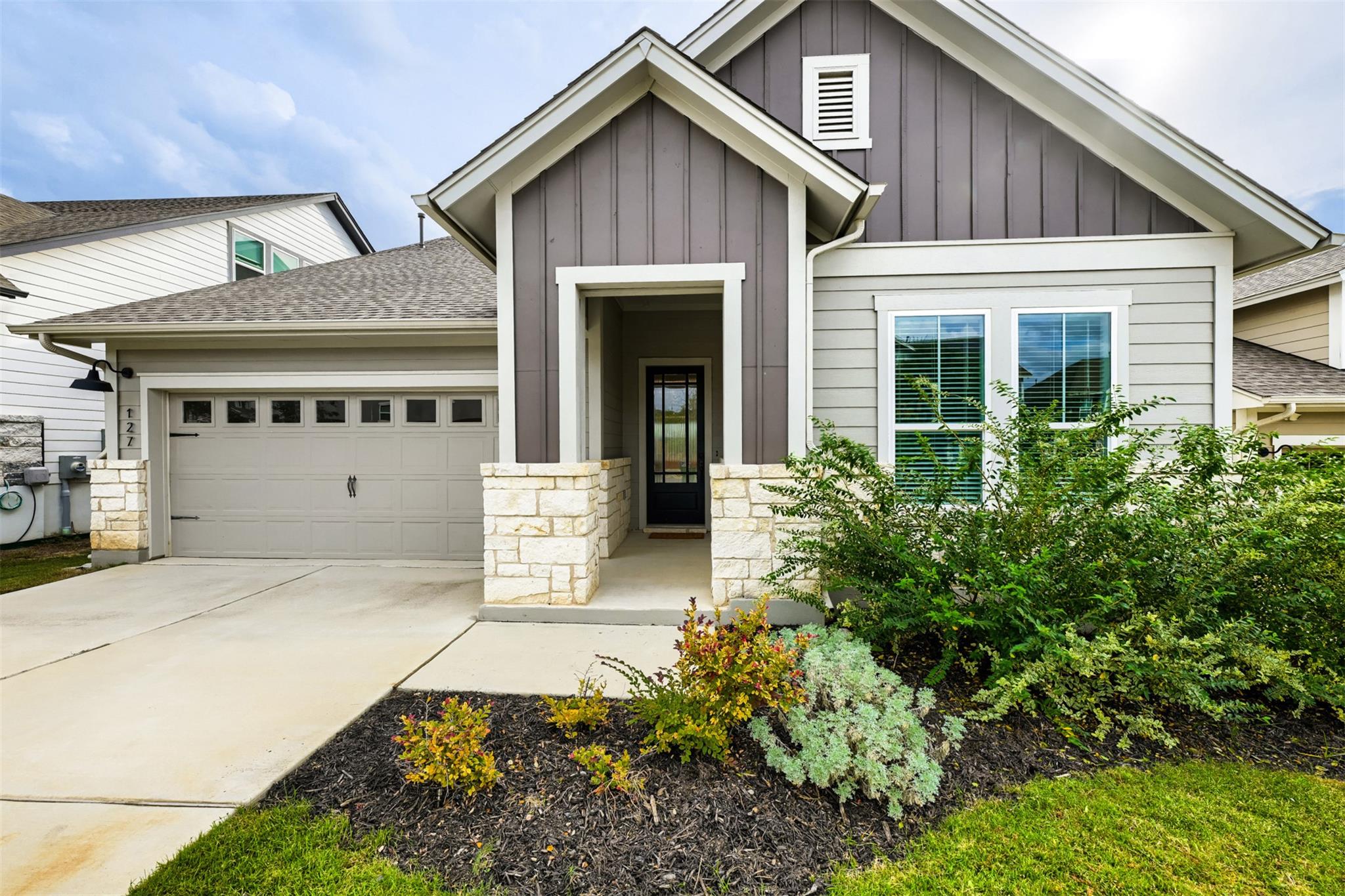 Craftsman architectural details paired with stone