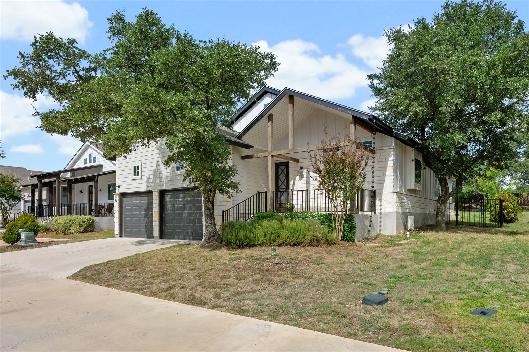 Craftsman architectural elements and stone accent