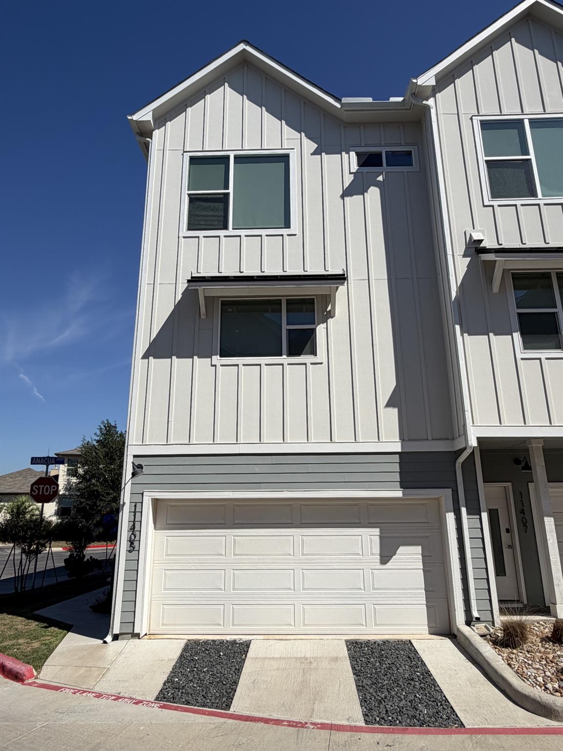 Modern vertical siding and clean architectural li