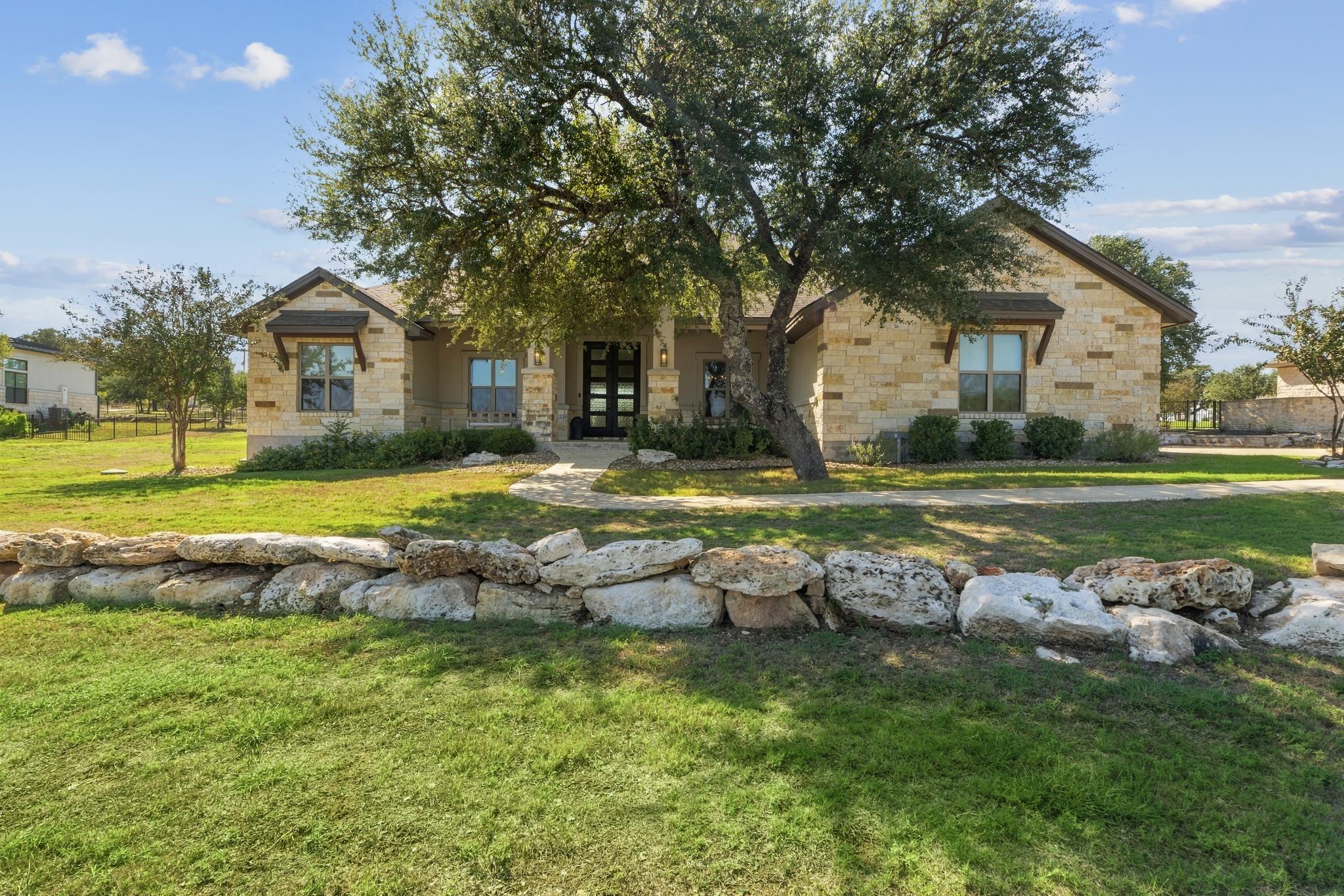 Custom stone accents and professional landscaping