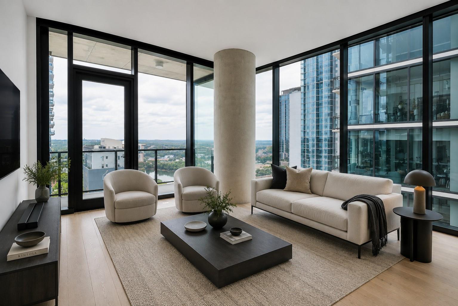 Floor-to-ceiling glass walls frame dramatic city 